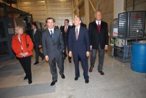 En el centro: Nahuel Caputto y Hèctor Magnetto
